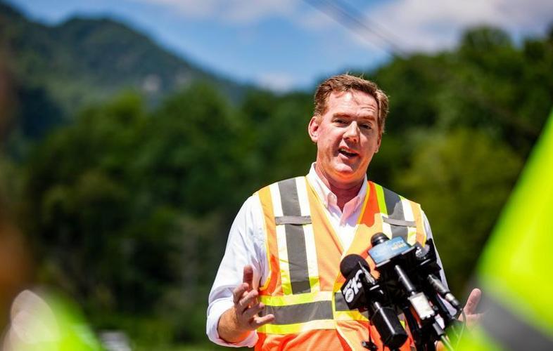 North Carolina Department of Transportation Secretary Daniel Johnson speaks with reporters about ongoing recovery work in Chimney Rock on July 30, 2026.