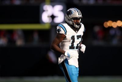 Nov 16, 2025; Atlanta, Georgia, USA; Carolina Panthers wide receiver Xavier Legette (17) returns to the sideline during the fourth quarter against the Atlanta Falcons at Mercedes-Benz Stadium. Mandatory Credit: Brett Davis-Imagn Images