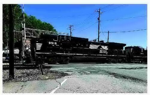 Test train travels through Old Fort on repaired tracks once damaged in hurricane
