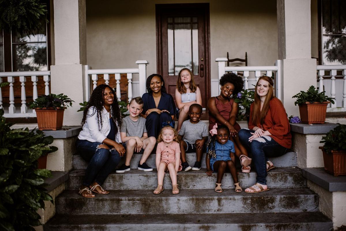 Shadese Griffith, left, and Whitney Gilbert, right, pose for a photo. The special "Our 2 Moms" was filmed in Statesville.