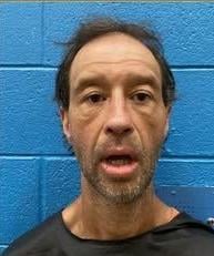 Nebo man charged with kicking open front door of house