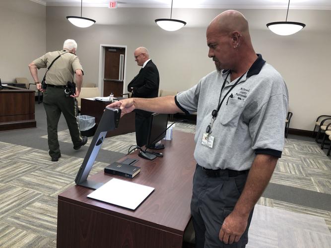 Officials cut the ribbon for new courtroom at McDowell Courthouse