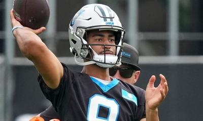 Aug 4, 2026; Charlotte, NC, USA; Carolina Panthers quarterback Bryce Young (9) throws  during training camp at Bank of America Stadium. Mandatory Credit: Jim Dedmon-Imagn Images