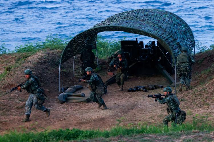 Taiwanese soldiers participate in a live-fire drill during the Han Kuang military exercise in Penghu