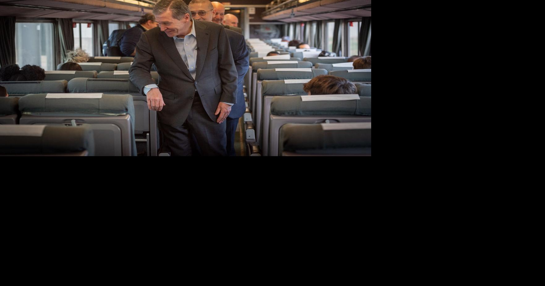 Governor Cooper rides the rails to promote passenger trains