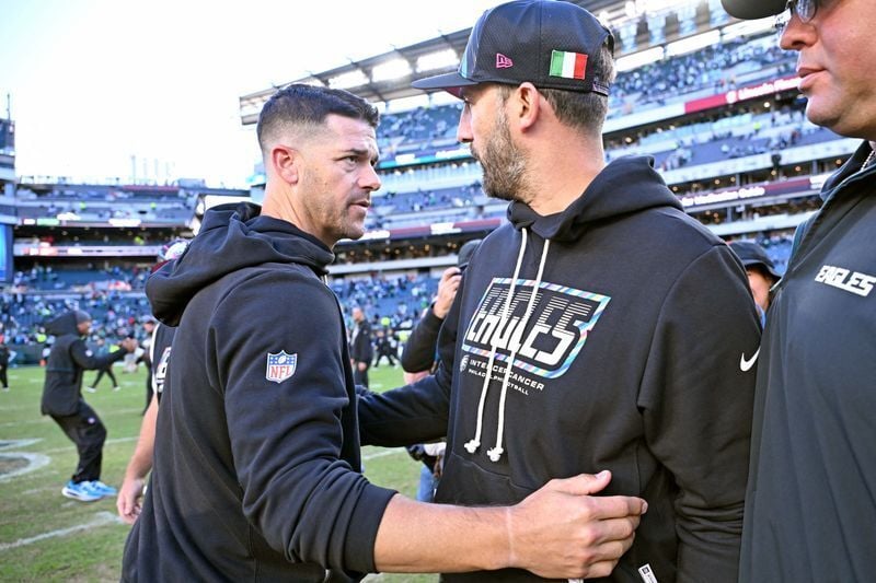 Oct 18, 2026; Philadelphia, Pennsylvania, USA; Carolina Panthers head coach Dave Canales and Philadelphia Eagles head coach Nick Sirianni meet on the field after the game at Lincoln Financial Field. Mandatory Credit: Eric Hartline-Imagn Images