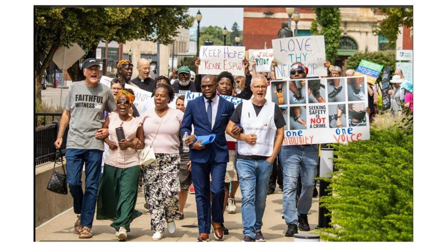 Religious leaders led a march around Springfield City Hall on Aug. 30 calling for ICE to end its surveillance of Haitian residents.