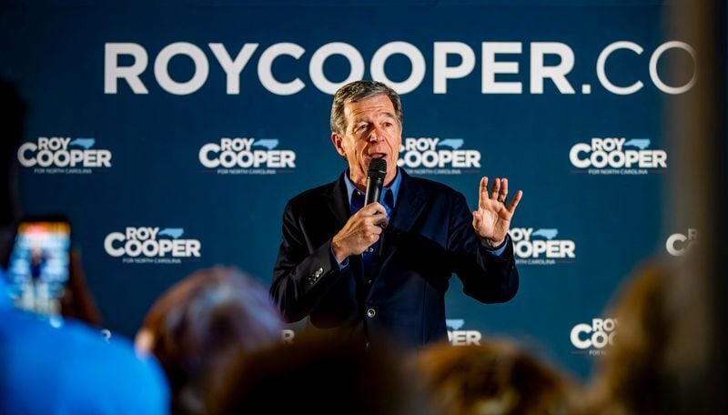 Former North Carolina Gov. Roy Cooper speaks during a “Make Stuff Cost Less” event at Oklawaha Brewing Company in Hendersonville on Aug. 20, 2026.