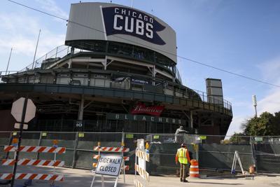 Workers continue construction around Wrigley Field on Monday, Oct. 26, 2026, in Chicago.