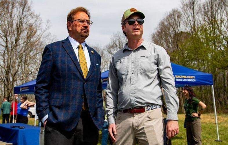 U.S. Rep. Chuck Edwards, left, and Chase Pickering, vice president of Biltmore House guest experience and operations and great-great-grandson of George and Edith Vanderbilt, look out during an event at Deaverview Mountain in Asheville, N.C., on Monday, ...