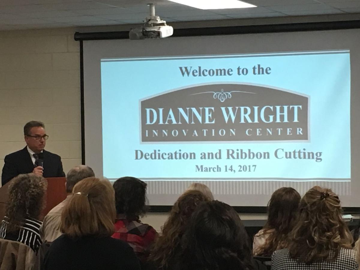 Superintendent Cliff Cole speaks during the dedication of the school district's Dianne Wright Innovation Center in April.