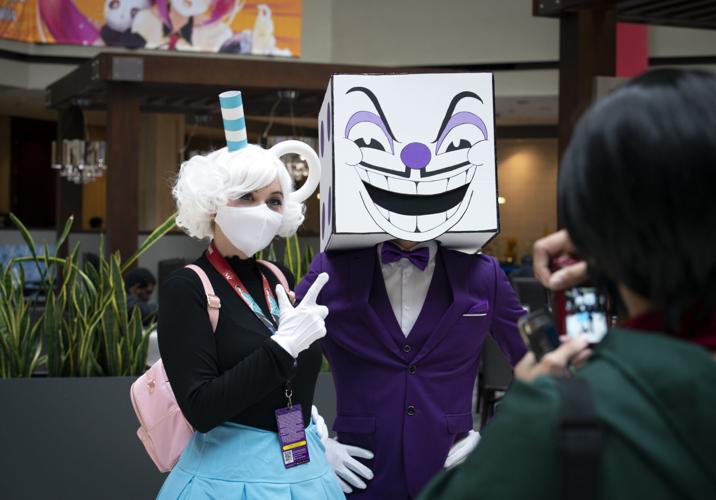 A cosplayer dressed as King Dice from the video games Cuphead