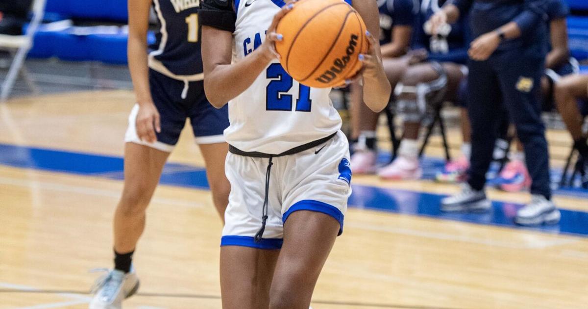 Binion leads Campbell to Holiday Classic title