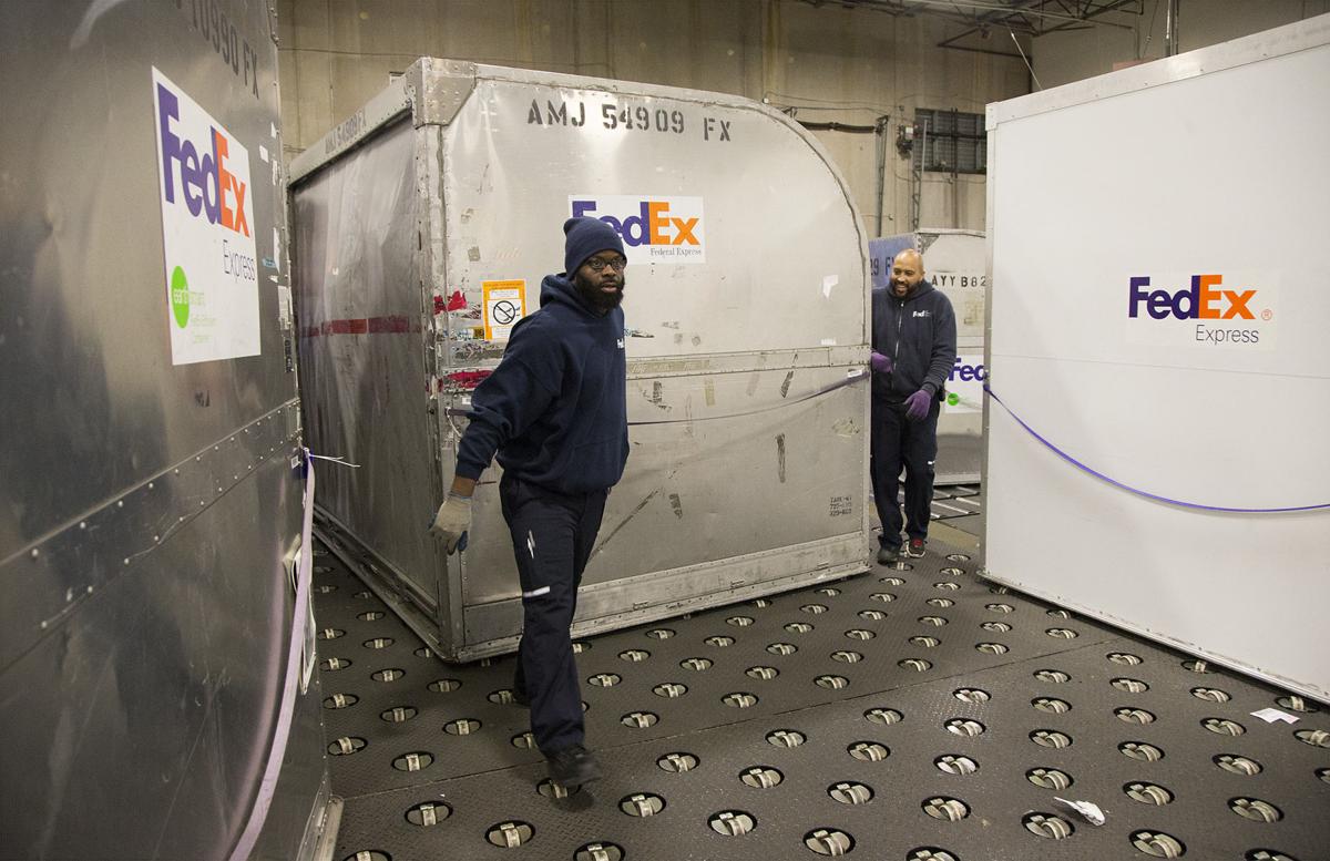 Shipping your shopping Marietta FedEx employees sort, deliver holiday