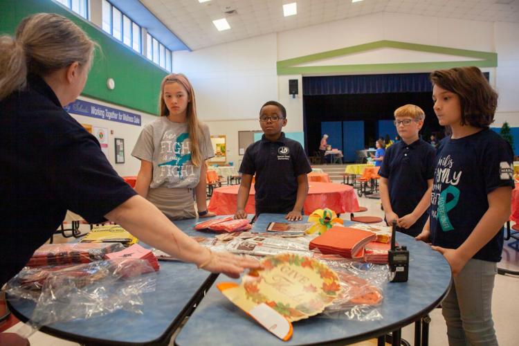 Sawyer Road student leaders serve community, feed needy families News