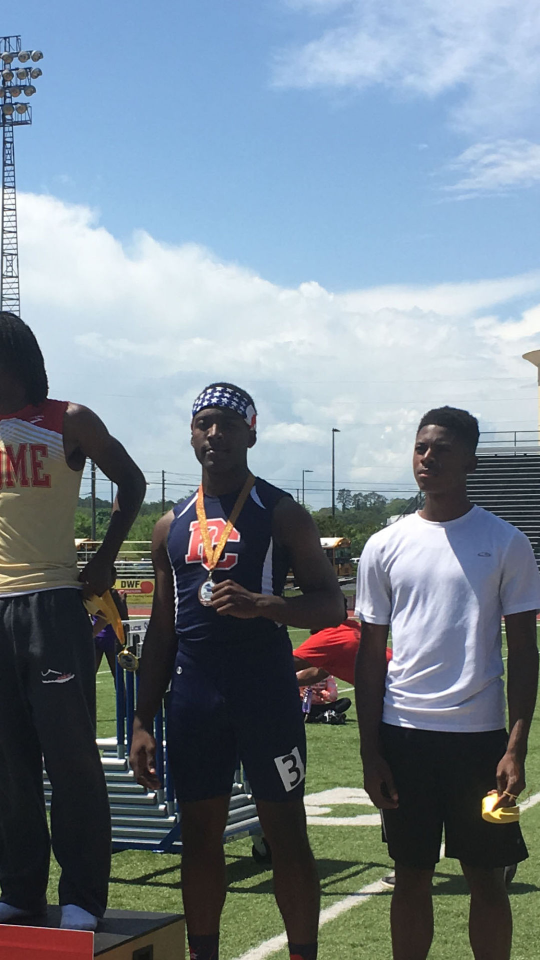 Paulding County High sprinter Cam Pittman, center, is shown at the recent Region 7-AAAAA meet in Rome.