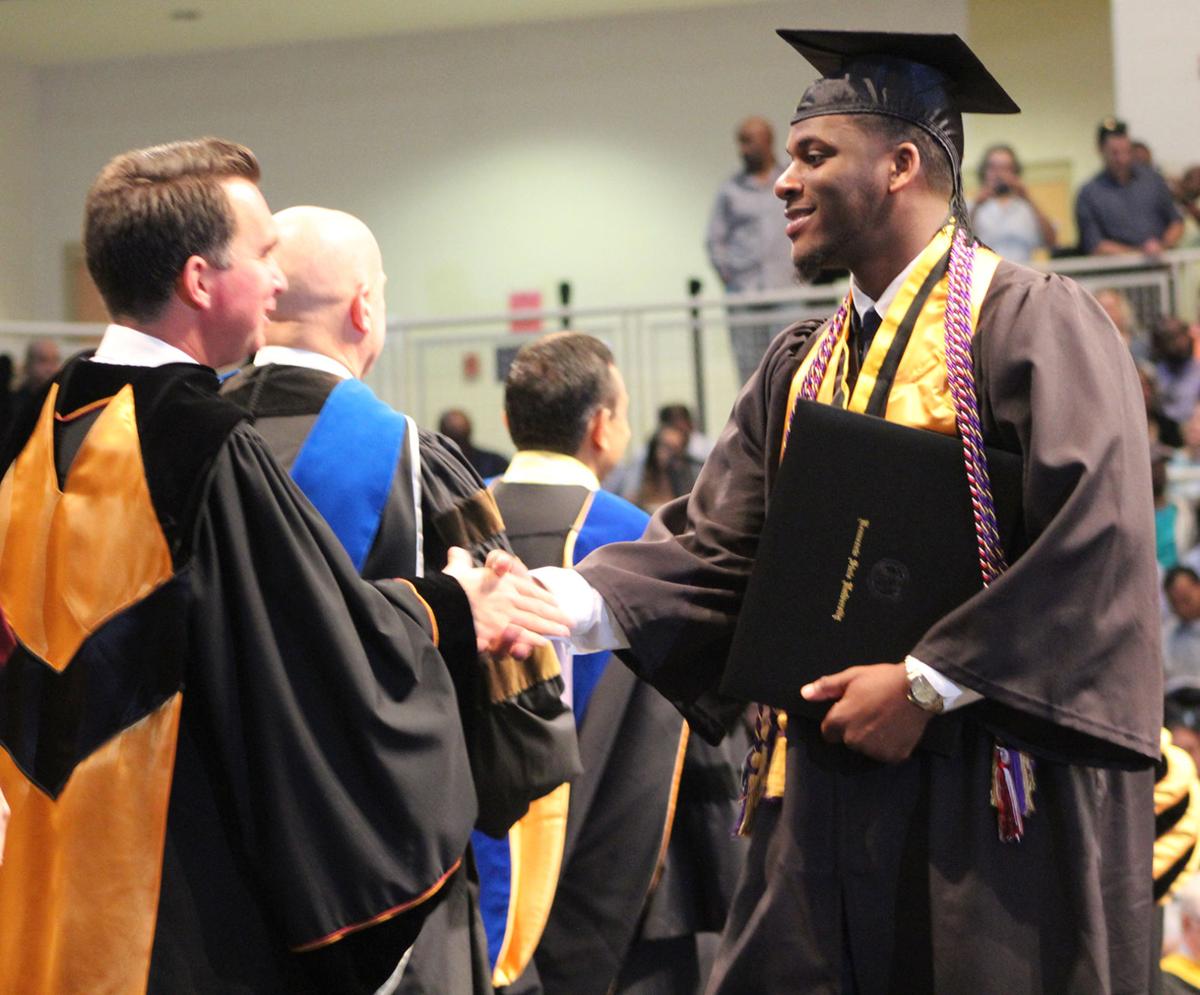 More than 3,200 students walk across Kennesaw State University's stage