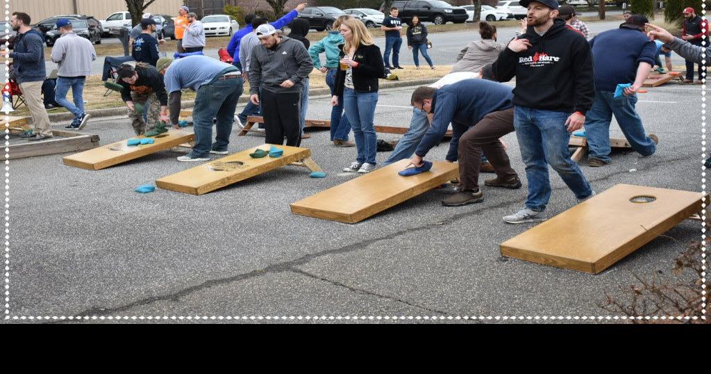 Dunwoody’s Cornhole for a Cause to raise funds for those needing vision ...