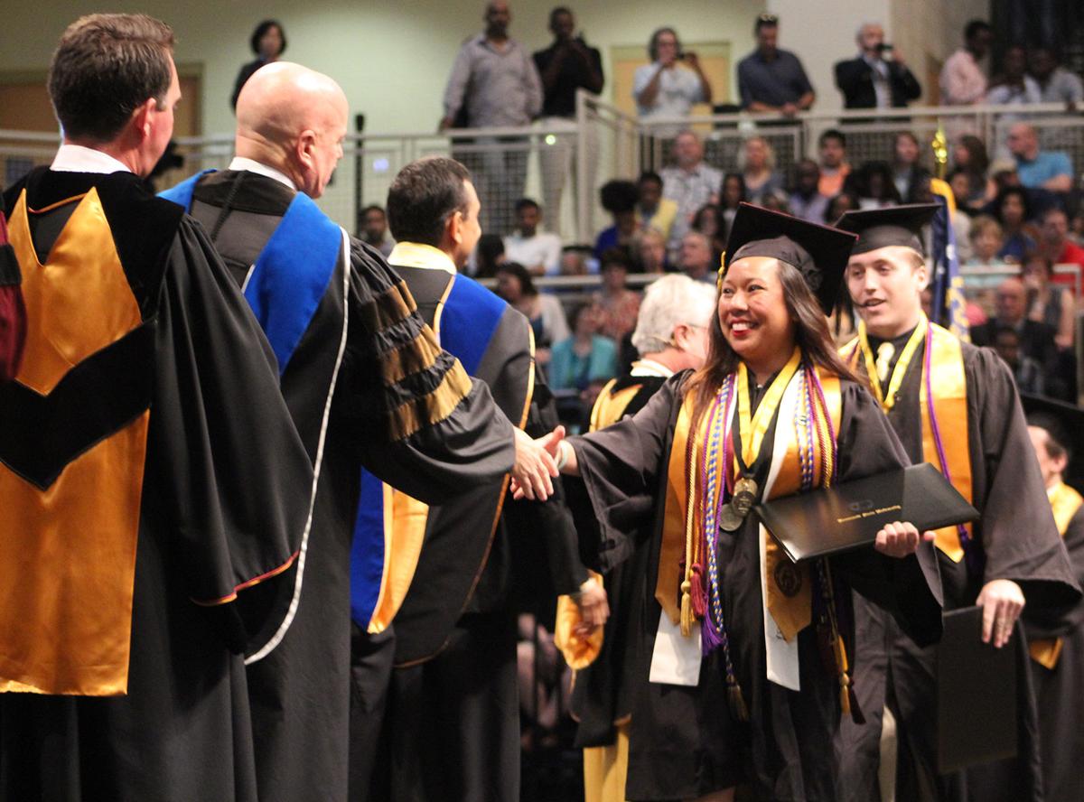 More than 3,200 students walk across Kennesaw State University's stage