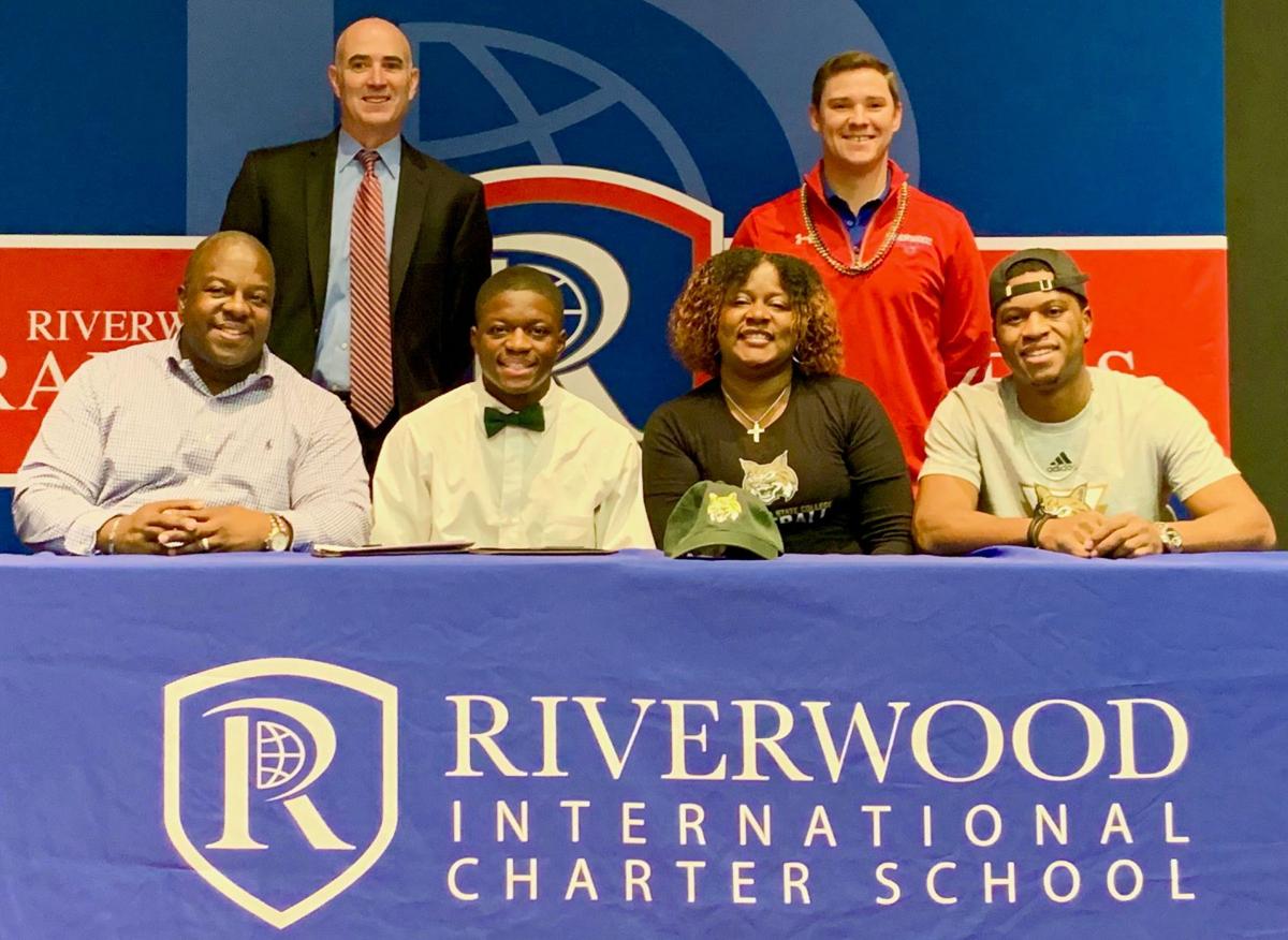 121819_MNS_full_Riverwood_signees_003 Jason Miller Danny Miller Kim Miller Jalen Miller Michael Mezzio Trey Henson