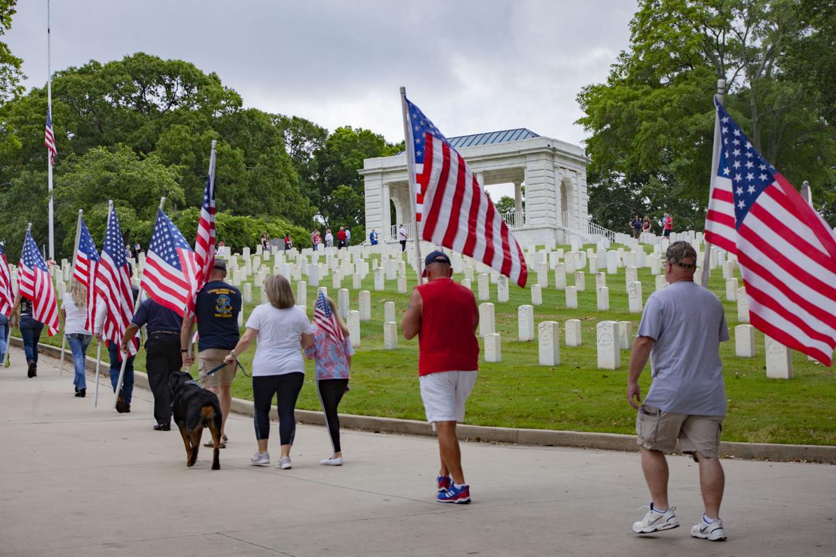 Locals gather to observe Memorial Day at Marietta National Cemetery