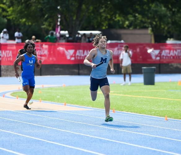 Blue Devil Devin Clark runs leg 3 of the GHSA 7A 4x400M State Finals. SPECIAL//Leah Watson