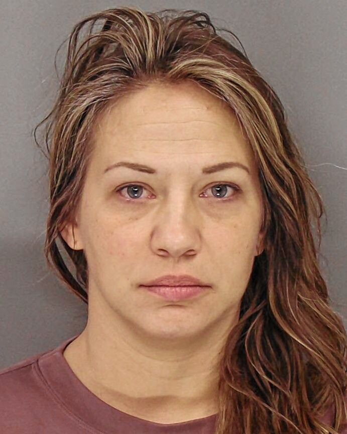 Kennesaw woman accused of DUI, running over person at gas station ...