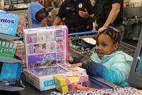 125 Durango-area children 'Shop with a Cop' at Walmart – The