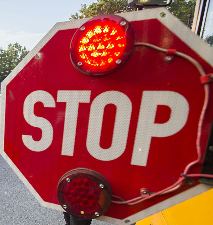 county commissioners renew contract with school district school bus