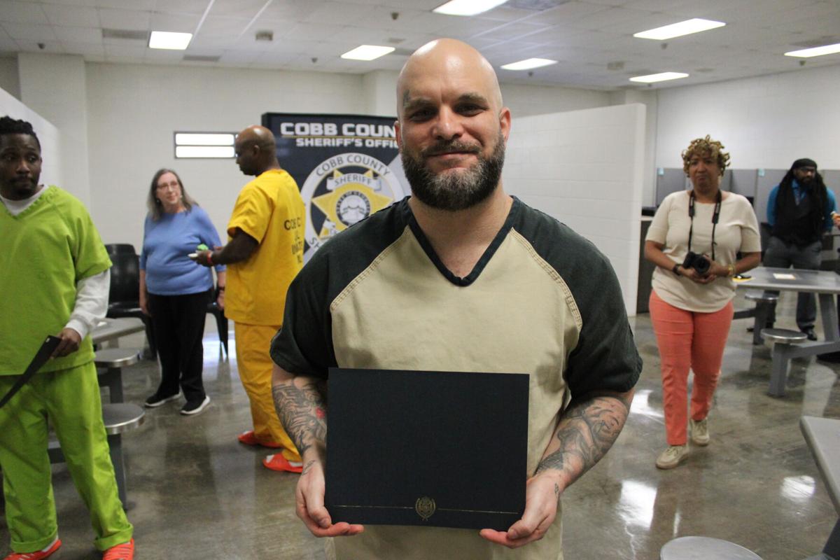 'Moving forward' Cobb Jail Inmates Graduate with GEDs Police Fire
