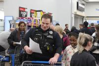 125 Durango-area children 'Shop with a Cop' at Walmart – The