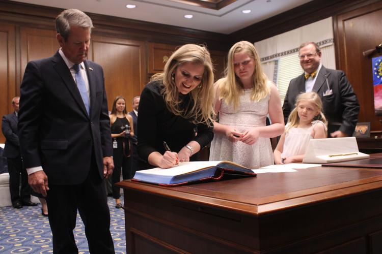 Vic Reynolds Julie Jacobs sworn in as Cobb Superior Court judges