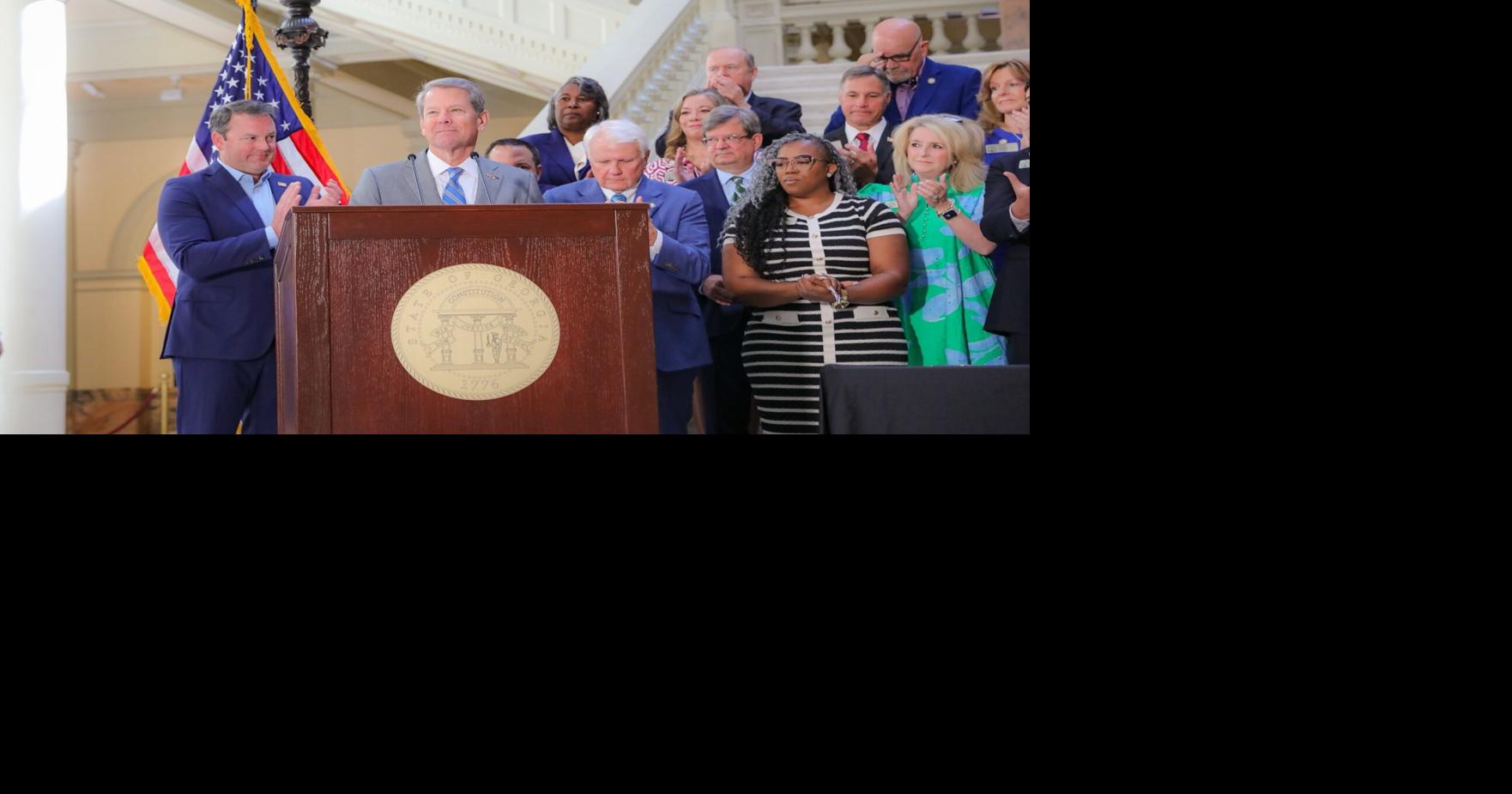 Kemp signs legislation to cut income taxes and reduce homeowner property tax increases