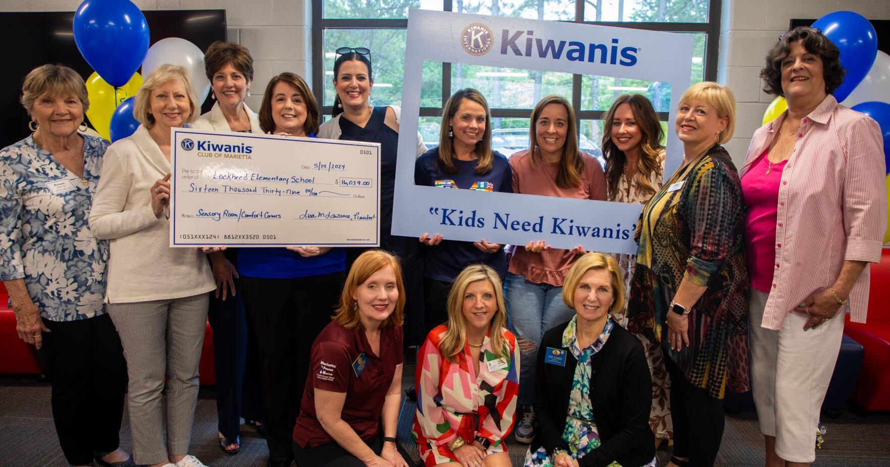 Kiwanis Club of Marietta Presents Check to Lockheed Elementary - Vimarsana News