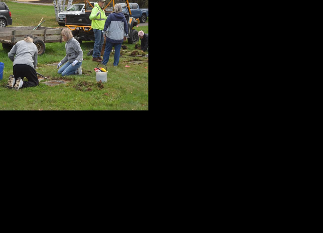 Maintaining graves means honoring memories in cemetery clean-up event ...