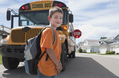 Boy and school bus