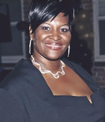 PAULA E. SIMMONS