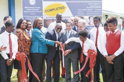 Ribbon cutting ceremony of Myrtle Grove K-8 renovation project