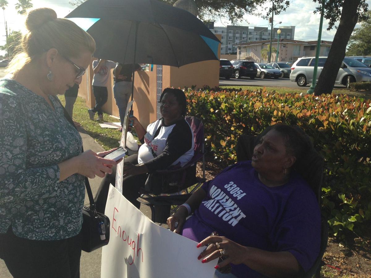Protesters at Opalocka City Hall calling for Mayor Myra Taylor to step