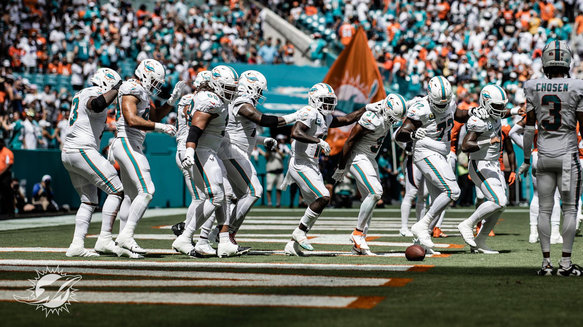 Miami Dolphins defensive end Christian Wilkins (94) celebrates a big  defensive play in the firs …