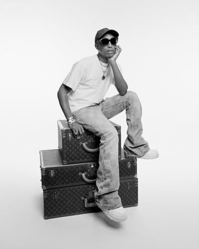 Pharrell Williams stages Louis Vuitton debut on Pont Neuf