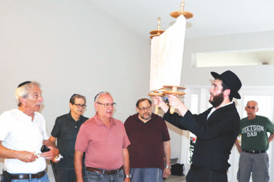 aloft the Torah