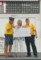 Reflections donates $4400 to Vet Relief