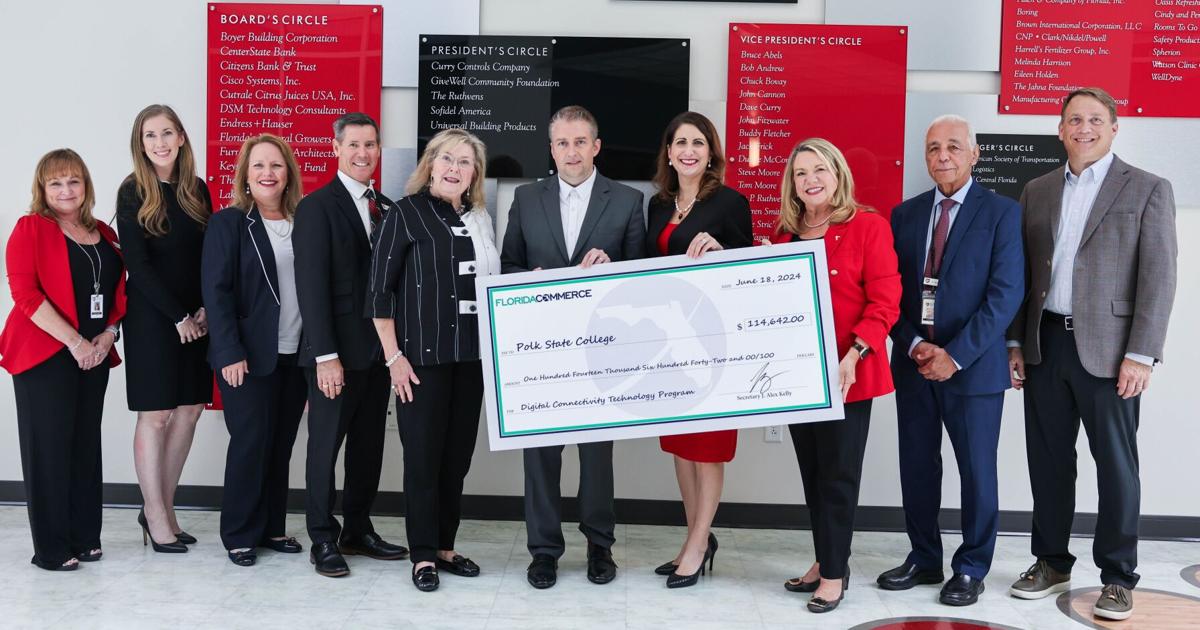 Florida Secretary of Commerce Alex Kelly delivers gift to Polk