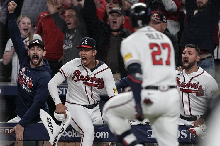 Braves first MLB team to clinch playoff berth this year, rally to