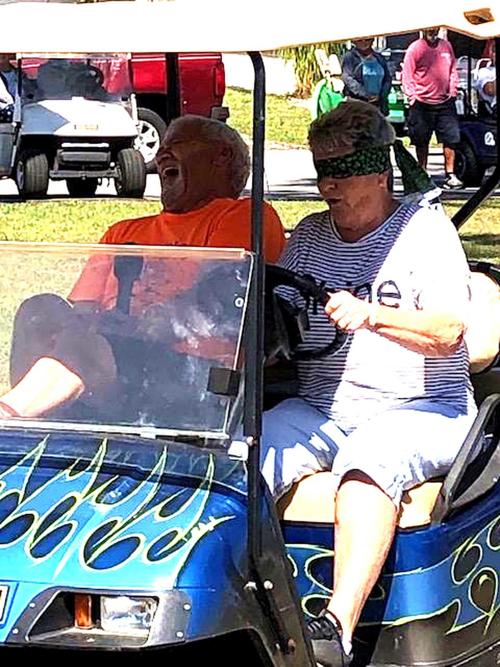 Joy and Mike annual golf cart races