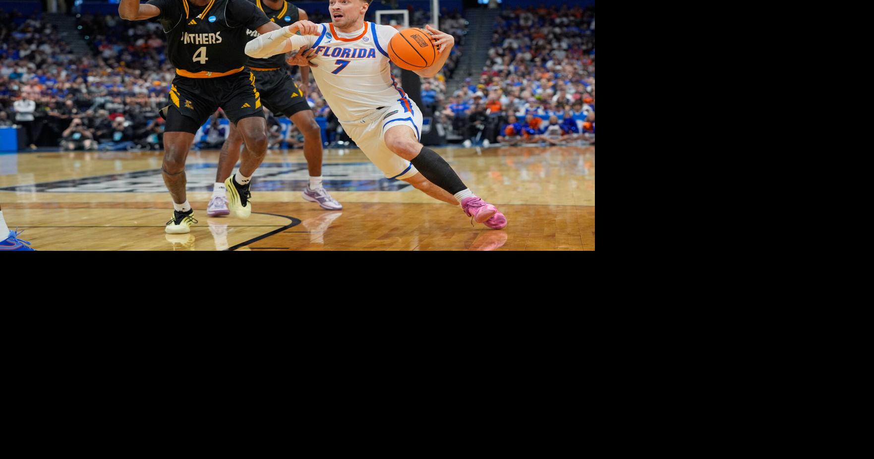 Gators begin title defense with 59-point rout