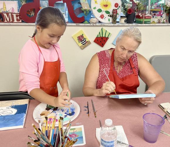 Red Easel holds weekly 'Canvas and Cupcakes' Highlands Sun