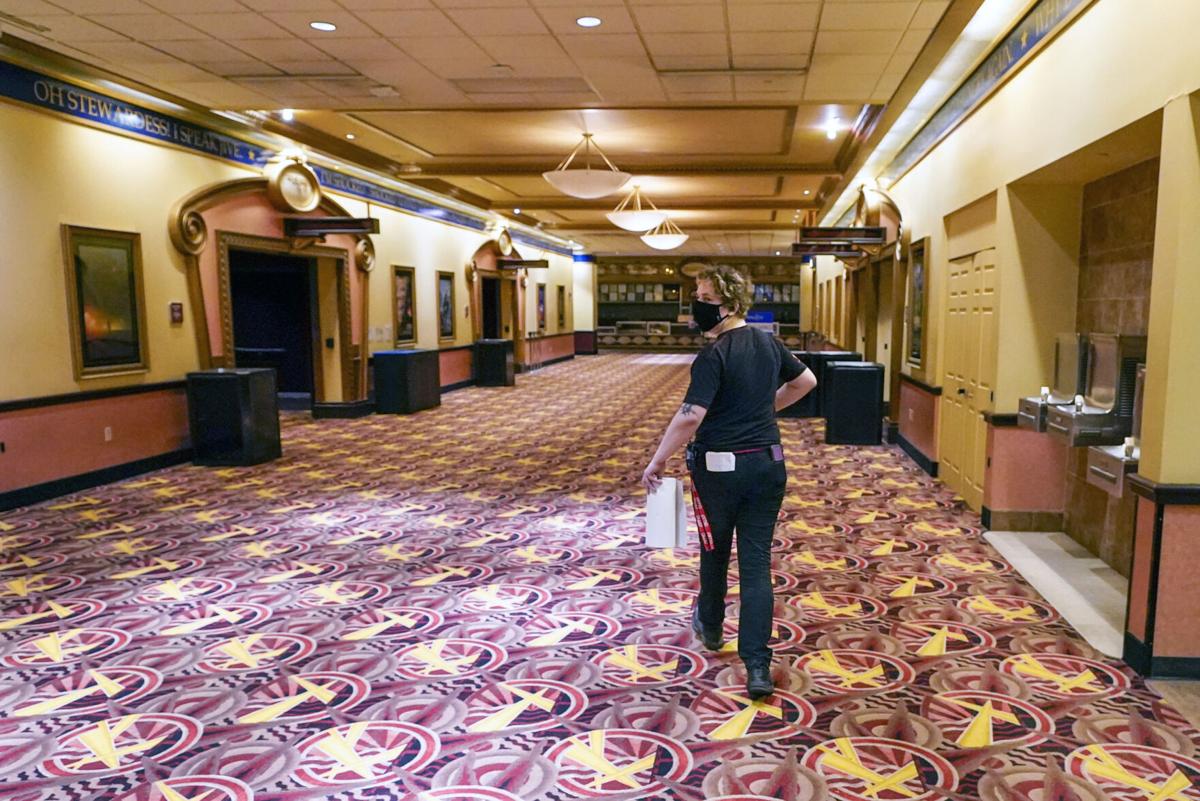 After 5 months, AMC Theaters reopens its doors, cautiously ...