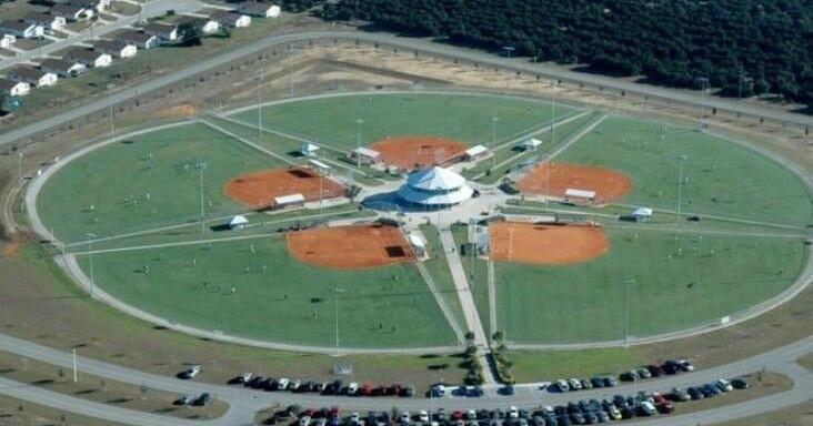 County to buy land to expand sports complex